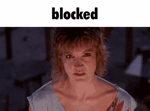 a picture of a woman with the word blocked on the top