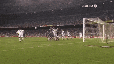 a group of soccer players on a field with the word laliga on the bottom
