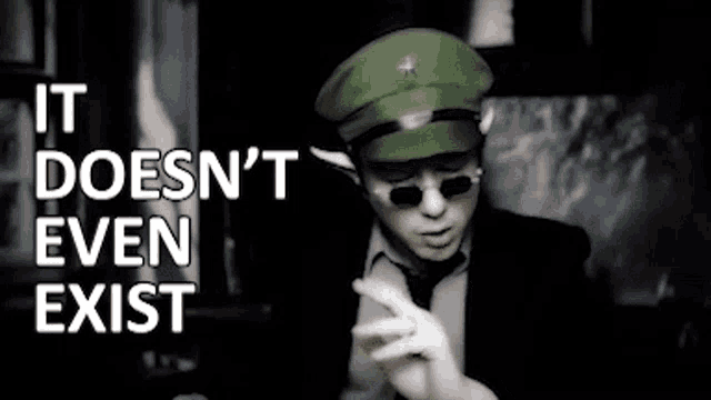 a man in a green hat and sunglasses says it doesn 't even exist