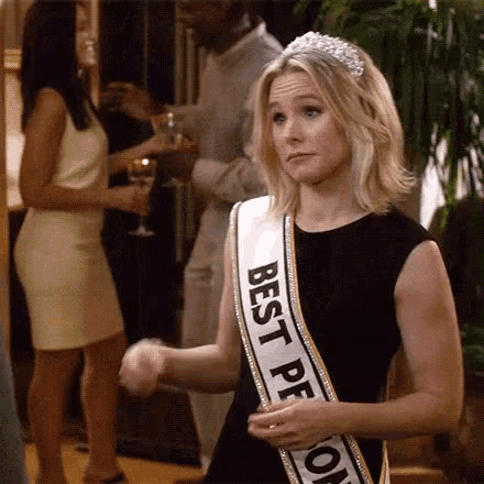 a woman is wearing a sash that says " best person "