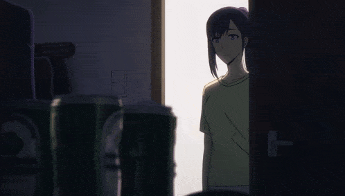 a man and a woman are standing next to each other in a room