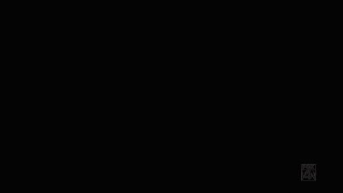 a blurred image of a person 's face with the letters fox on the bottom