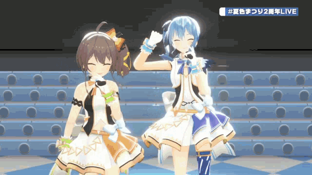 two anime girls are standing next to each other on a stage and the words live are on the bottom right