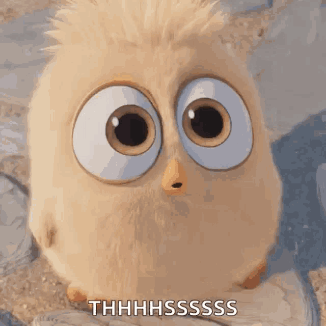 a cartoon bird with big eyes and a yellow beak is standing next to a person 's foot .
