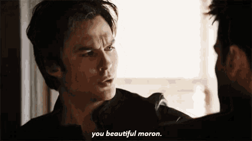 a man talking to another man with the words you beautiful moron