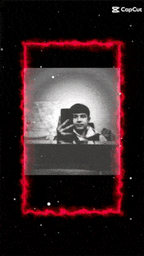 a cell phone with a picture of a man on the screen and the words capcut on the bottom