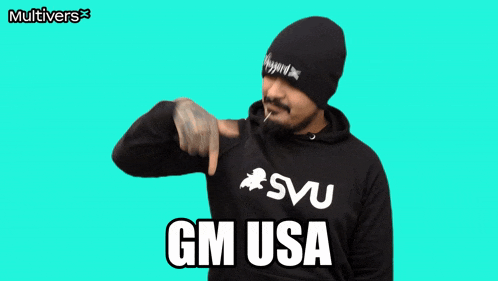 a man wearing a sweatshirt that says gm usa on it
