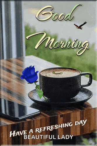 a good morning greeting card with a cup of coffee and a blue rose on a wooden table