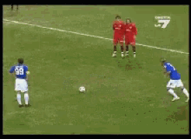 a soccer game is being played in front of a sign that says highbeam