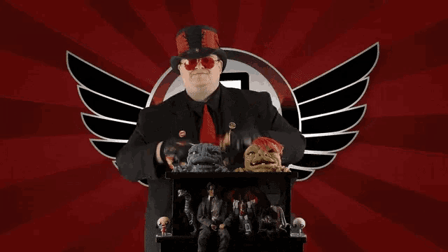a man in a suit and top hat stands in front of a red background that says " fuck my gay life "