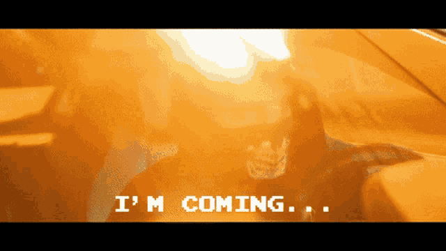 a screen that says i 'm coming in a pixelated style