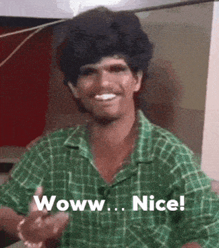 a man in a green plaid shirt is making a funny face and saying wow nice .