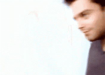 a close up of a man 's face with a white background .