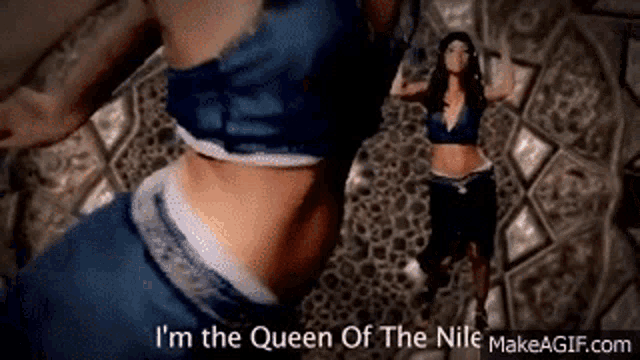 a woman is dancing on a tiled floor in a video .