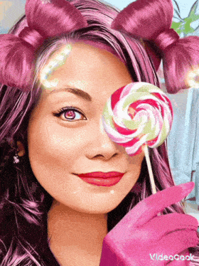 a woman with pink hair is holding a colorful lollipop in front of her eye