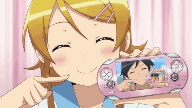a girl is smiling while holding a pink video game