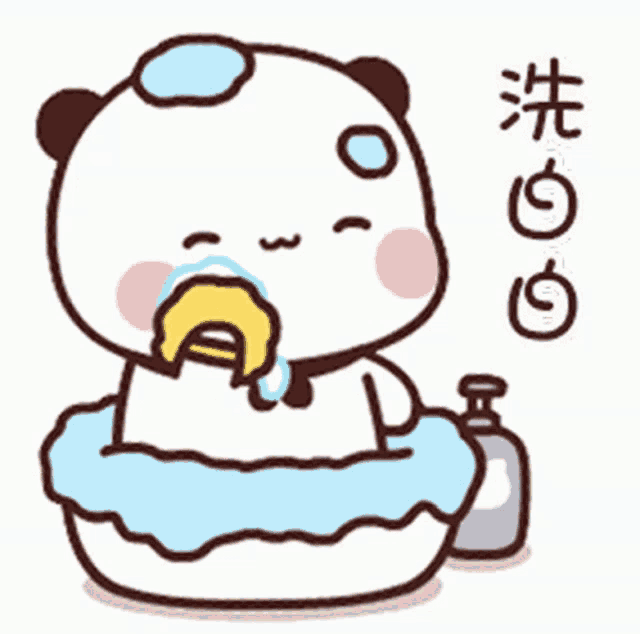 a panda bear is taking a bath in a bathtub .