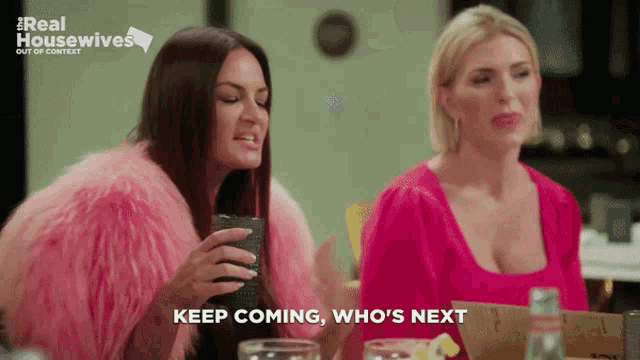 two women sitting at a table with the words keep coming who 's next on the screen