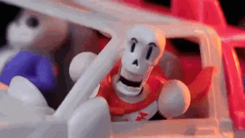 a toy skeleton is sitting in the back of a toy truck .