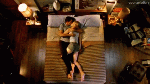 Lay On Bed Together Sleep Together GIF - Lay On Bed Together Sleep Together Kiss GIFs