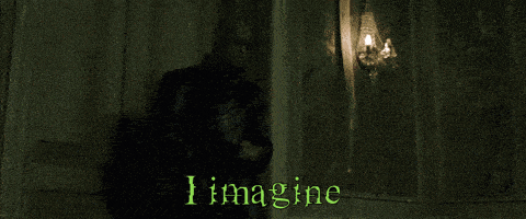 a man is standing in a dark room with the words that right now you 're feeling