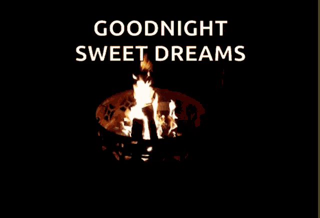 a fire pit with the words goodnight sweet dreams written above it
