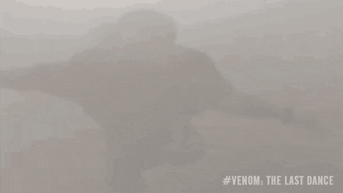 a person is flying through the air with #venom the last dance