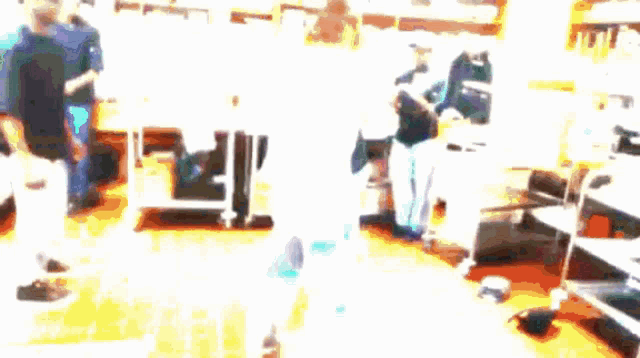 a blurry picture of a person standing in a room