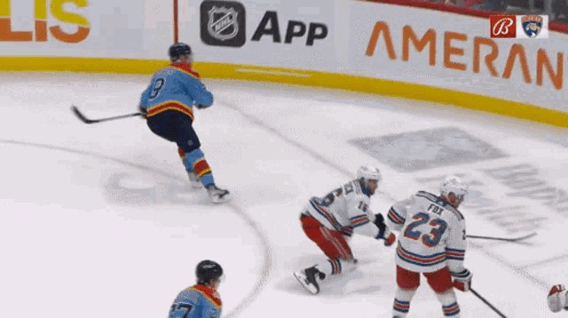 a hockey player in a blue jersey with the number 9