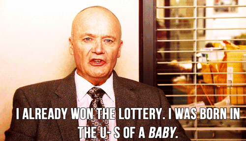 a bald man in a suit and tie is saying i already won the lottery