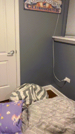 a bedroom with a sign that says cubs clubhouse on it
