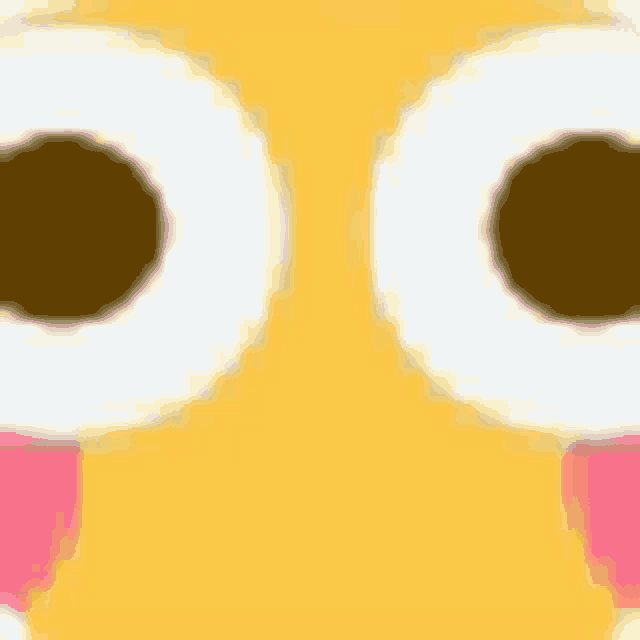 a close up of a cartoon face with big eyes and a pink tongue .