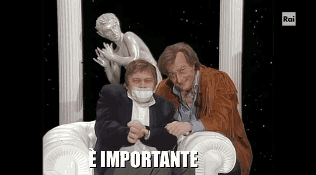 two men are sitting in a chair with a statue in the background and the words " e importante " in front of them