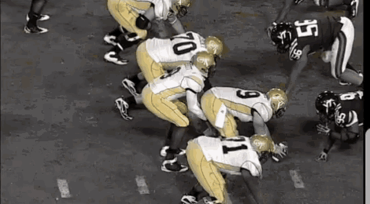 a group of football players one of whom has the number 10 on his back