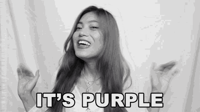 a black and white photo of a woman with the words it 's purple above her