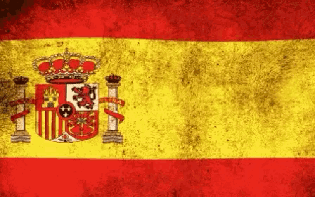 a yellow and red flag with a coat of arms and a crown