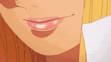 a close up of a woman 's mouth with pink lips and a white shirt .