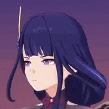 a close up of a person 's face with a sword in their hair .