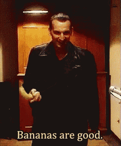 a man in a leather jacket is holding a banana and says bananas are good ..