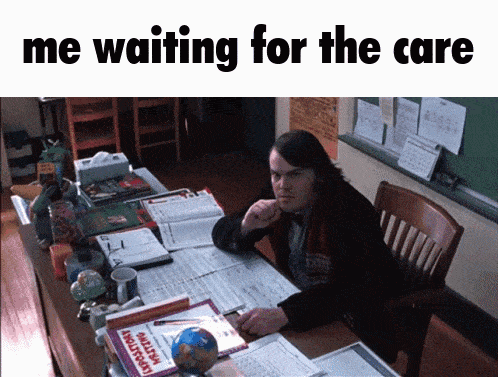 a man sits at a desk in front of a classroom with the words " me waiting for the care "