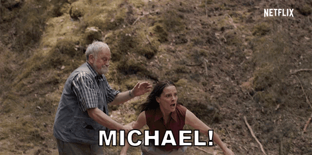a man is holding a woman in a netflix video