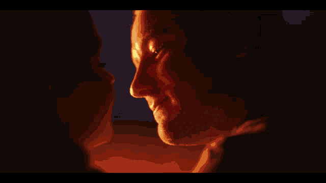a close up of a man and woman 's faces