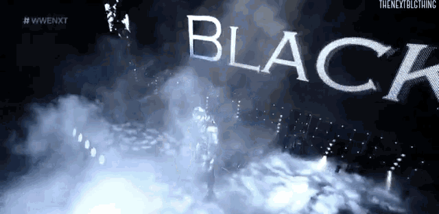 the word black is written in white on a dark background