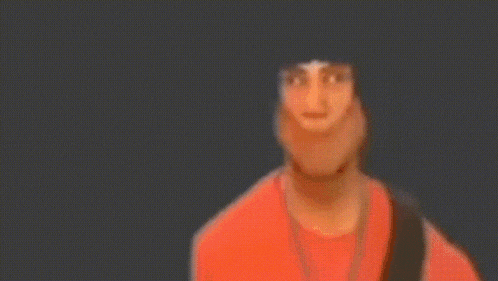 a blurry picture of a man in a red shirt holding a piece of paper .