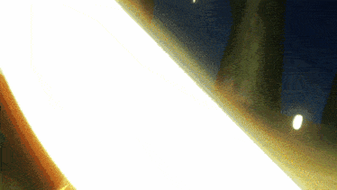 a light beam is coming out of a hole in a wall
