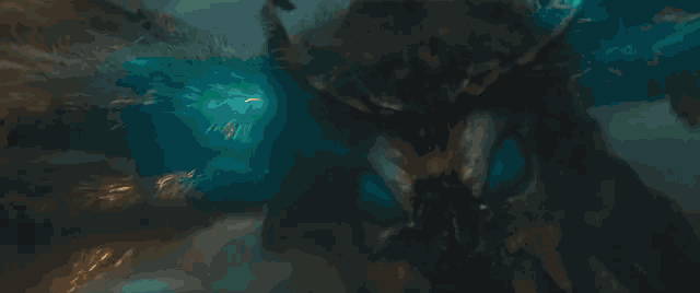 a dragon is flying through the air with a beam of light coming out of its wings .