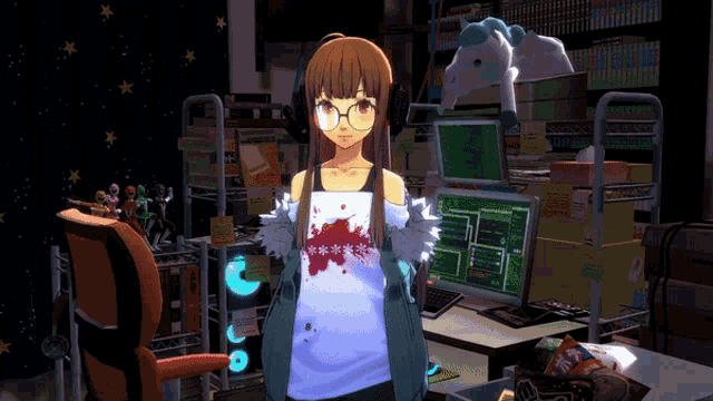 a girl wearing glasses stands in front of a desk with a computer monitor and a stack of books