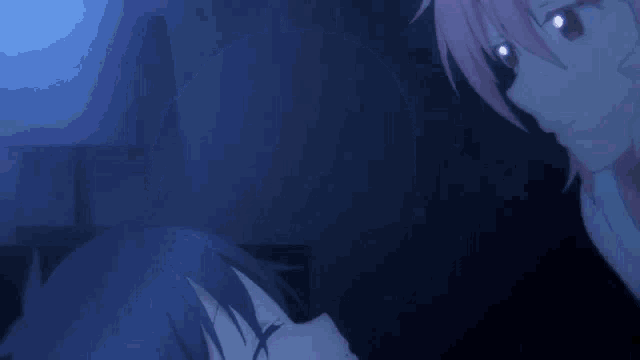 a girl with pink hair is laying on a bed with her eyes closed and a man holding her hair .