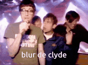 a man singing into a microphone with the words blur de clyde in the corner