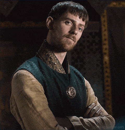 a man with his arms crossed and the words lord alchem gifs on the bottom left